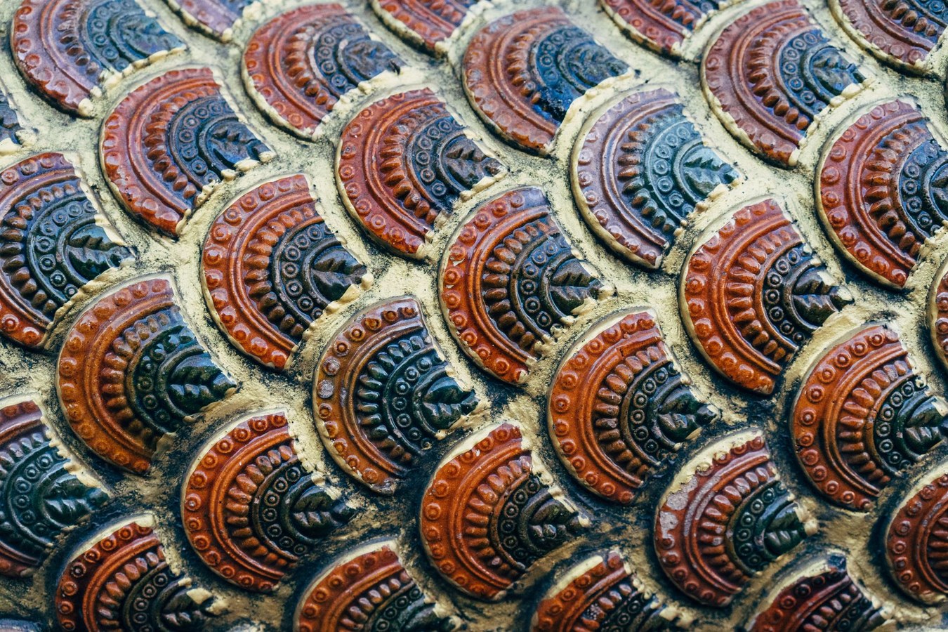 Glazed ceramic tiles on kiln shelf showing finished melbot surface detail